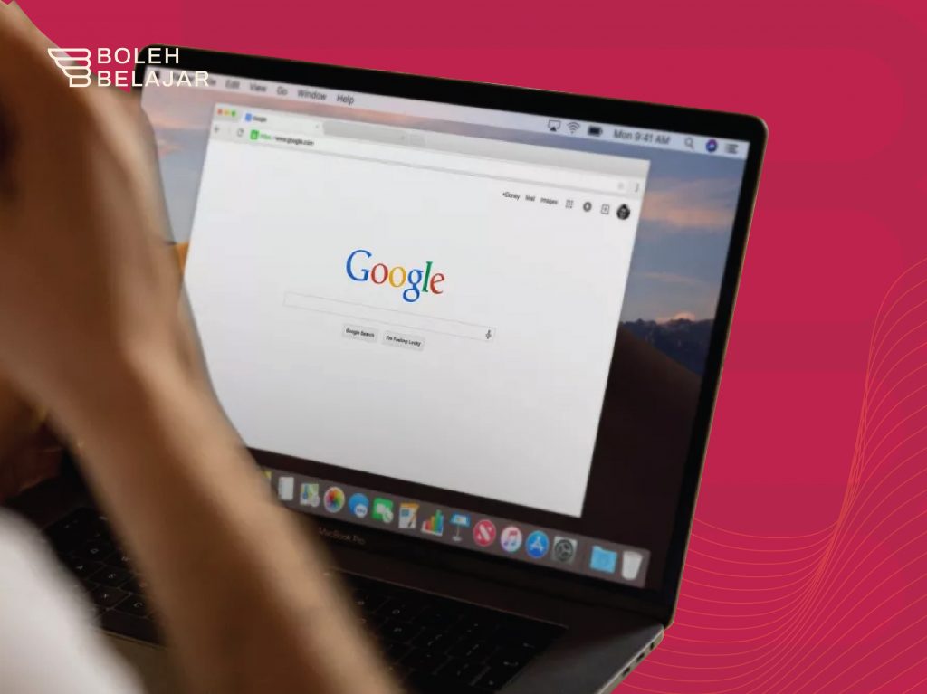 laptop dengan tampilan google